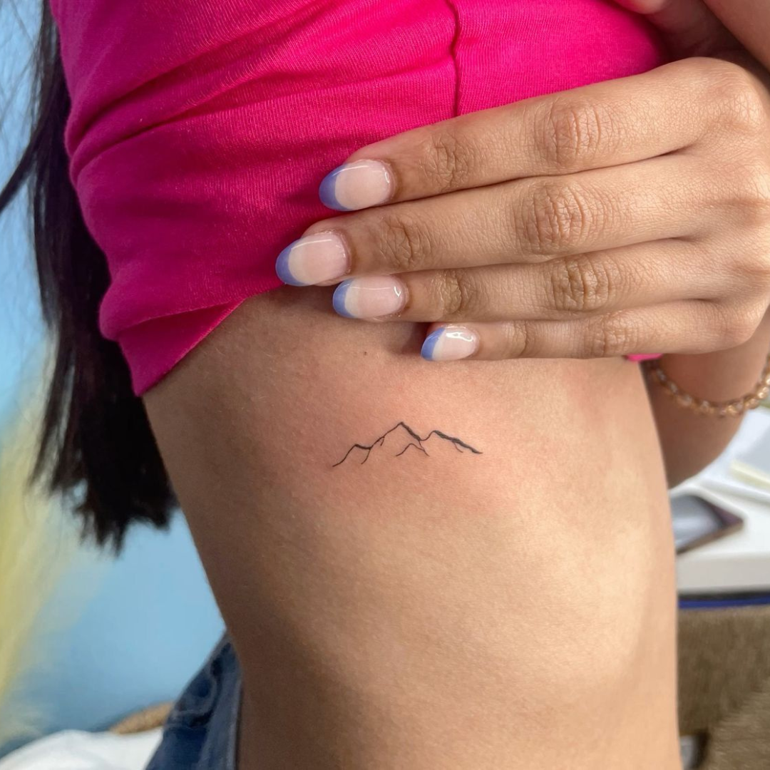 Minimalist Mountain Line Tattoo